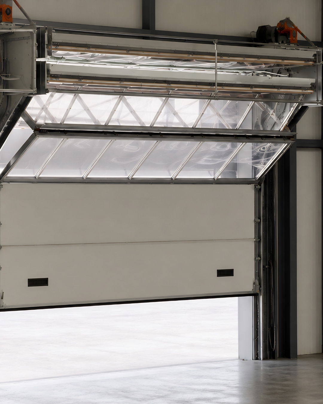puerta batiente industrial elevan Sevilla